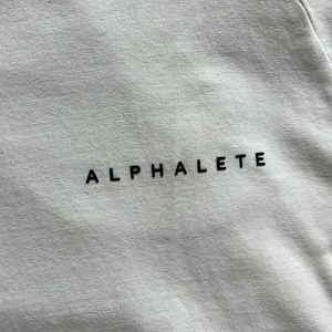 Alphalete Men’s Performance Tee with curved hem